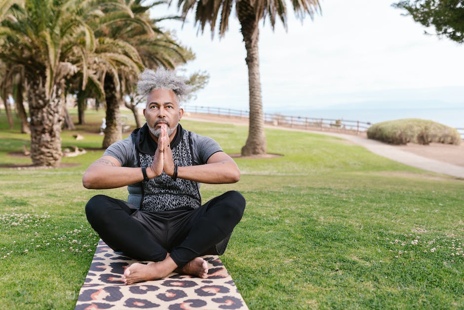 A serene image depicting a person meditating amidst nature, symbolizing mindfulness and mental health