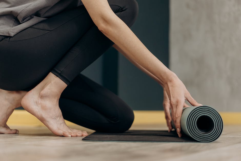 An image of a person practicing yoga on a mat.